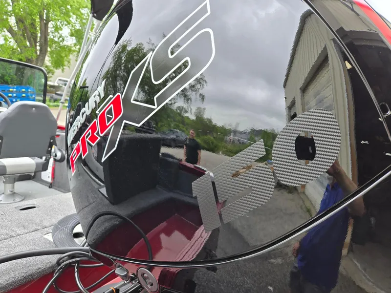 Slide: The Image of Mercury Pro XS engine on Lowe FS1800 boat, 2025 model, outdoors. - 9