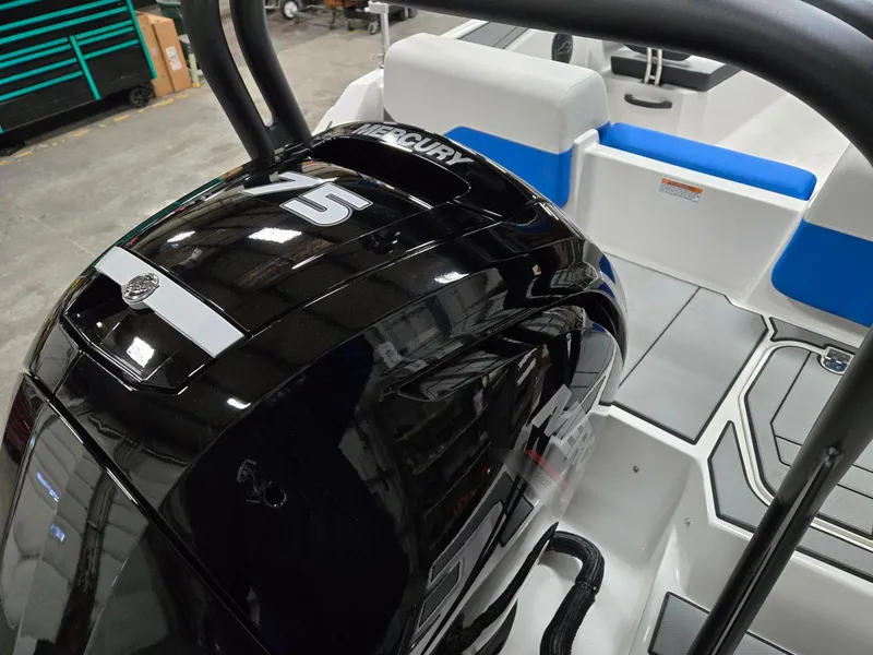 Slide: The Image of 2025 Starcraft SV16OB boat with Mercury 75 outboard engine, interior view. - 7