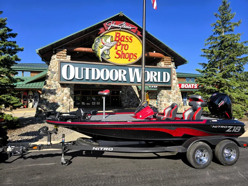 The Image of 2025 Nitro Z18 Pro boat displayed outside Bass Pro Shops Outdoor World. - 0