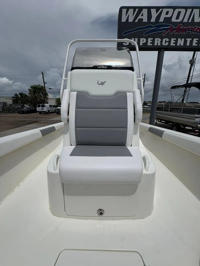 Slide: The Image of 2025 Mako 24 APEX boat seat with gray and white upholstery at Waypoint Marine. - 3