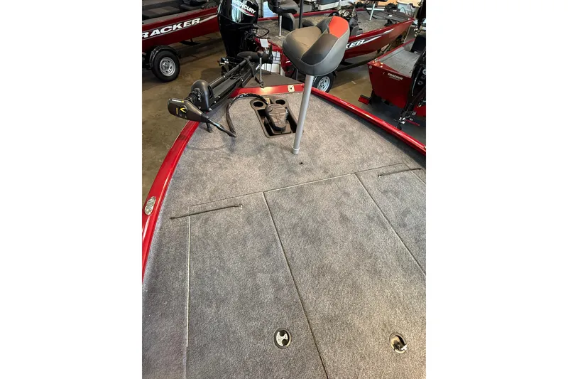Slide: The Image of 2025 Tracker Savage 215 boat deck with seat and trolling motor. - 8