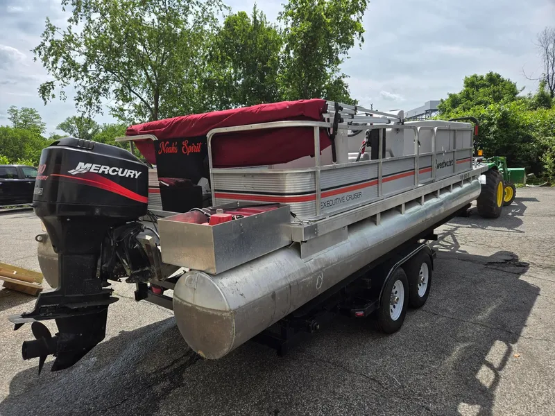 Slide: The Image of 1988 Sweetwater Executive Cruiser pontoon boat with Mercury outboard motor on a trailer. - 4