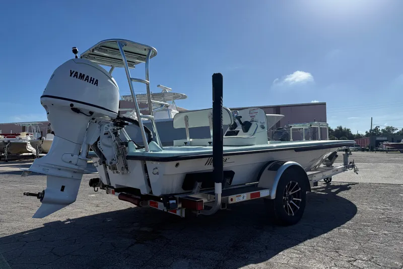 Slide: The Image of 2025 Maverick 17 HPX-S boat with Yamaha outboard engine on a trailer. - 8