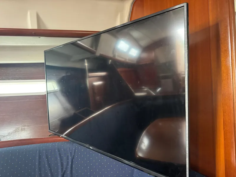 Slide: The Image of Flat-screen TV inside 2005 Beneteau Oceanis Clipper 373 yacht cabin. - 13