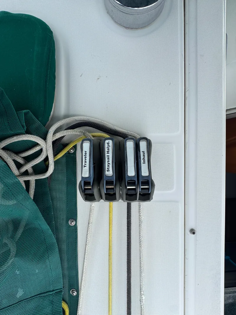 Slide: The Image of Rope clutches on a 2005 Beneteau Oceanis Clipper 373 sailboat deck. - 20