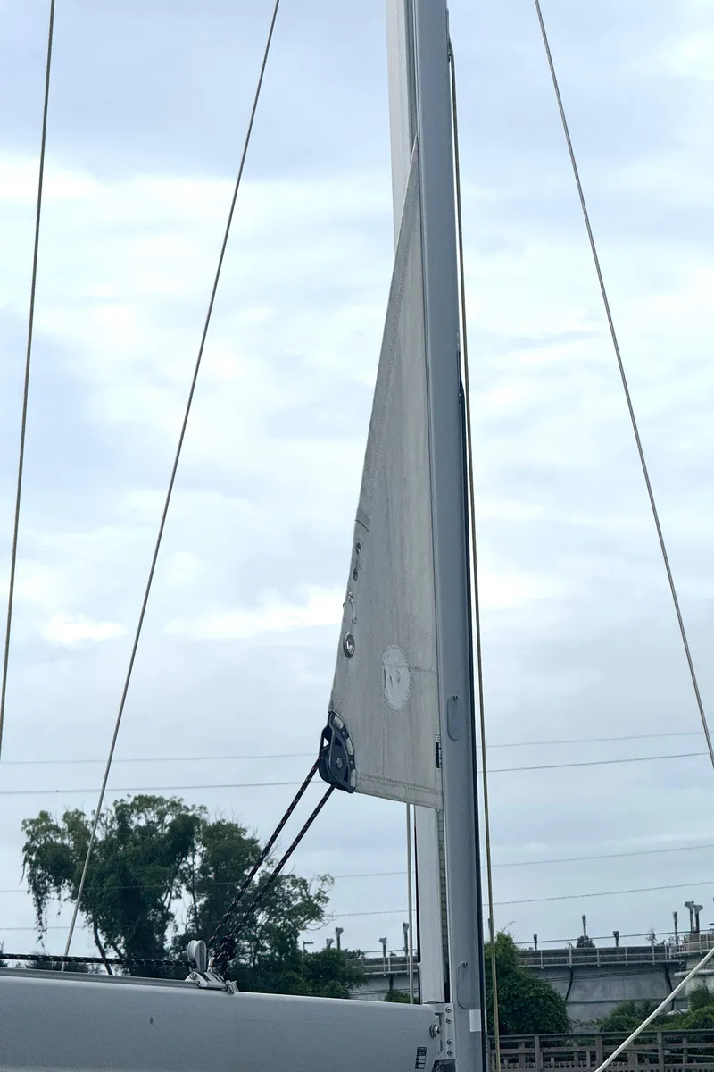 Slide: The Image of Sail of 2005 Beneteau Oceanis Clipper 373 against cloudy sky. - 38