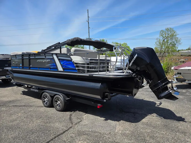 Slide: The Image of 2024 Starcraft Sls3qdh pontoon boat with Mercury outboard motor on trailer. - 3