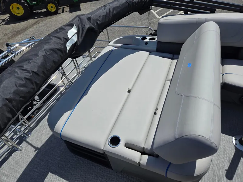 Slide: The Image of 2024 Starcraft Sls3qdh boat interior with gray seating and cup holders. - 9