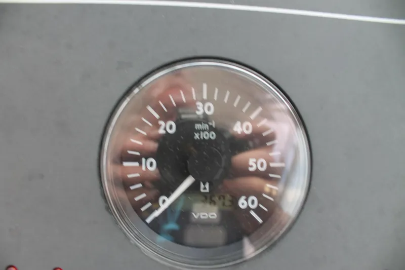 Slide: The Image of Close-up of a Tiara Yachts 2900 Coronet 2004 tachometer gauge. - 23