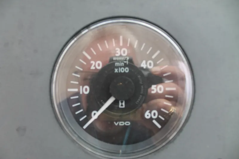 Slide: The Image of Close-up of a VDO tachometer on a 2004 Tiara Yachts 2900 Coronet. - 24
