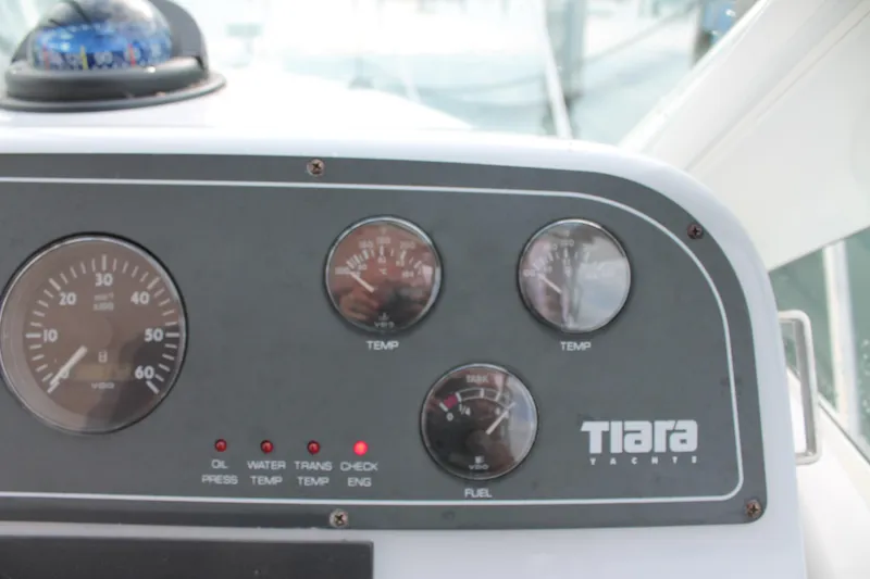 Slide: The Image of Dashboard of 2004 Tiara Yachts 2900 Coronet with gauges and indicators. - 25