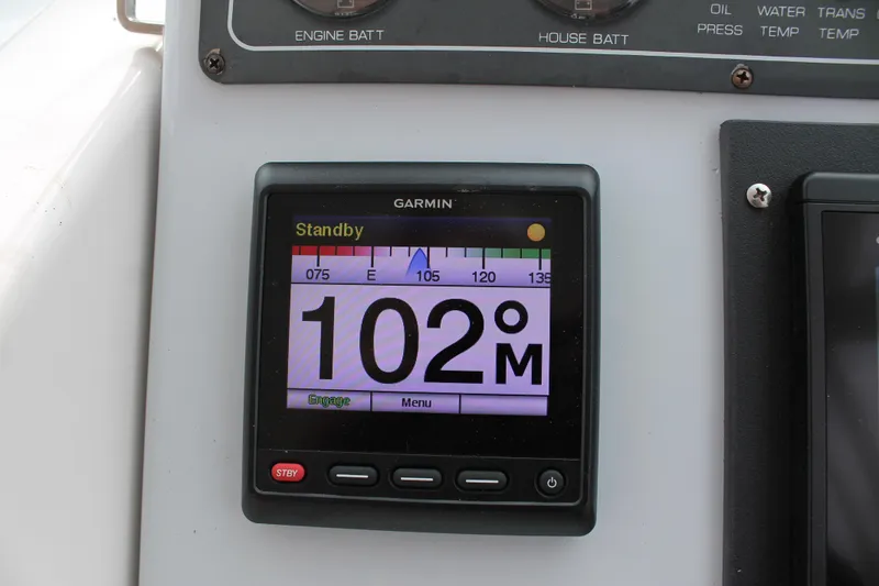 Slide: The Image of Garmin display on 2004 Tiara Yachts 2900 Coronet showing 102 degrees in standby mode. - 26