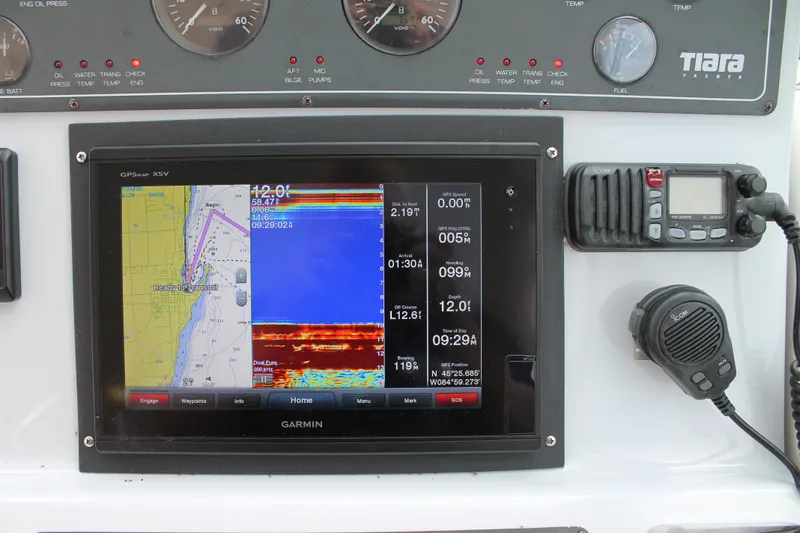 Slide: The Image of Dashboard of a 2004 Tiara Yachts 2900 Coronet with Garmin GPS and radio equipment. - 27