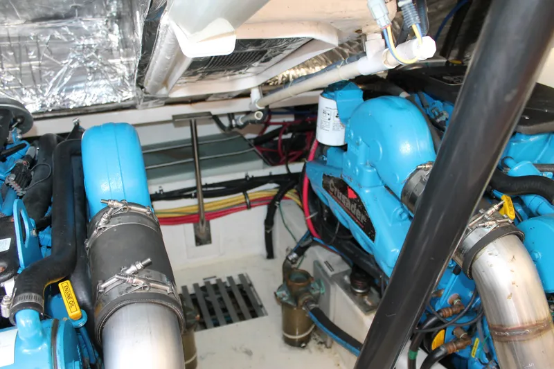 Slide: The Image of Engine compartment of 2004 Tiara Yachts 2900 Coronet with blue components and wiring. - 39