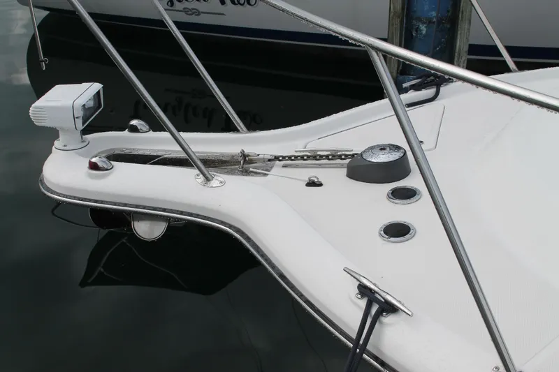 Slide: The Image of 2004 Tiara Yachts 2900 Coronet bow with anchor and railing details. - 4