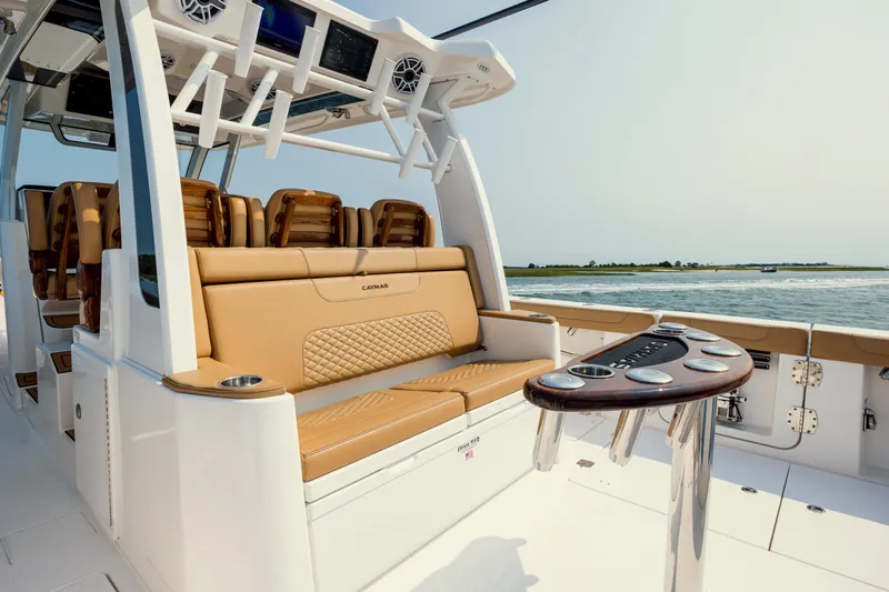 Slide: The Image of 2025 Caymas 44 CT boat interior with luxurious seating and ocean view. - 30