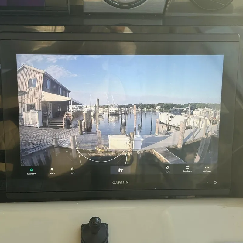 Slide: The Image of Garmin display showing marina view from 2006 Sea Ray 48 Sundancer yacht. - 13