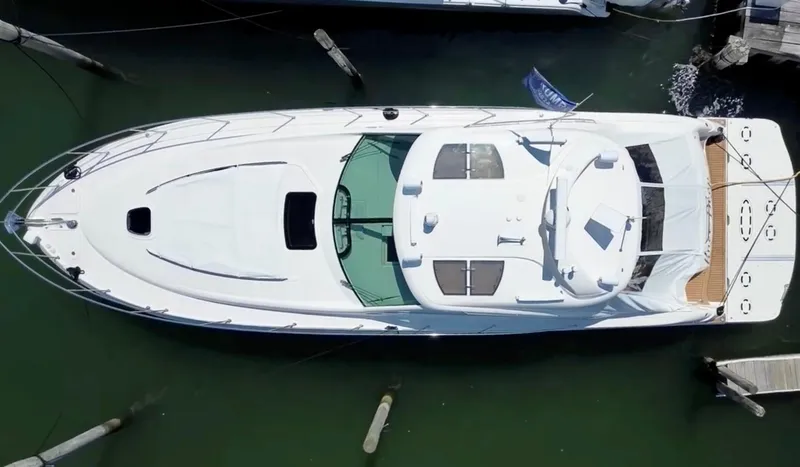 Slide: The Image of Aerial view of 2006 Sea Ray 48 Sundancer yacht docked in marina. - 2