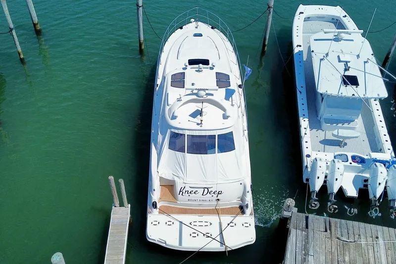 Slide: The Image of 2006 Sea Ray 48 Sundancer yacht docked in marina, aerial view. - 3