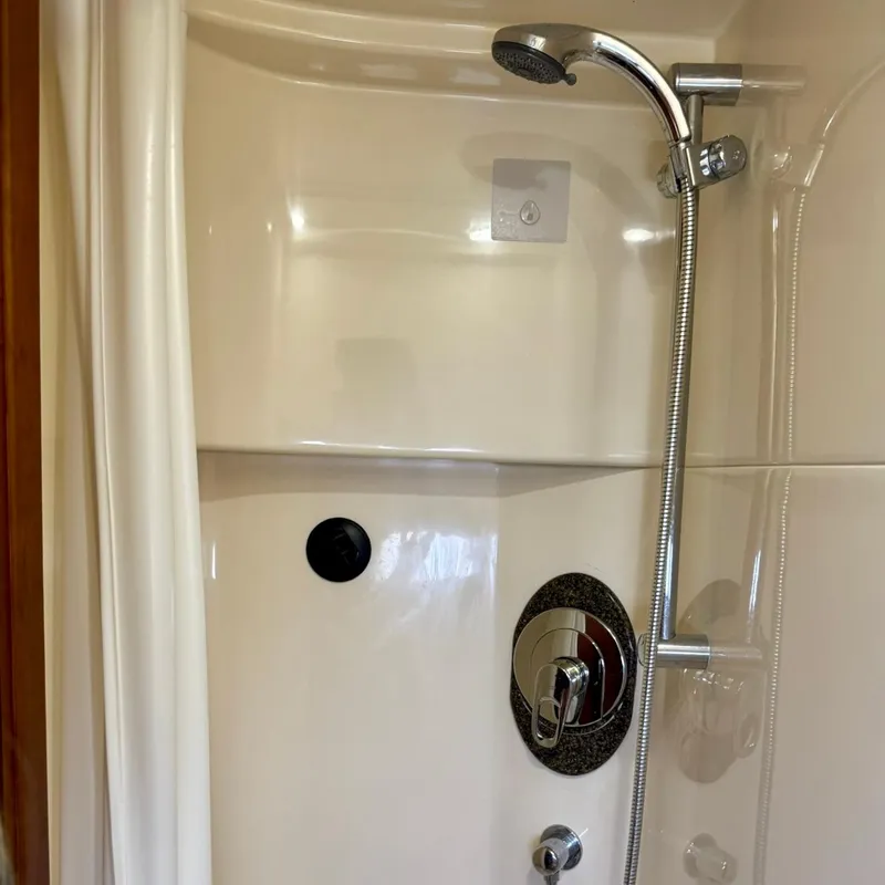 Slide: The Image of Shower area in 2006 Sea Ray 48 Sundancer yacht with chrome fixtures. - 35