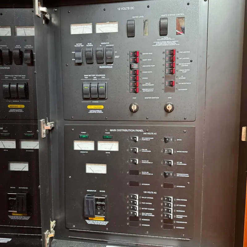 Slide: The Image of Electrical control panel on a 2006 Sea Ray 48 Sundancer yacht. - 36