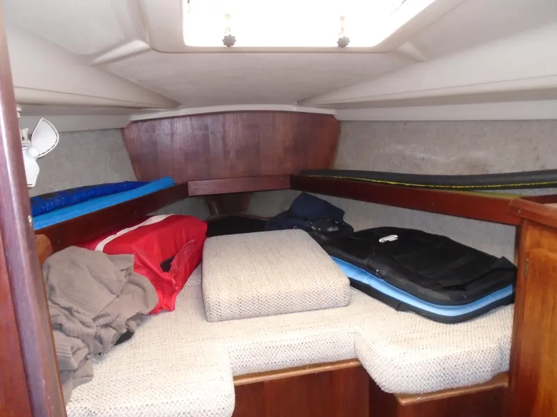 Slide: The Image of Interior cabin of 1989 Hunter 30 sailboat with cushions and storage. - 5