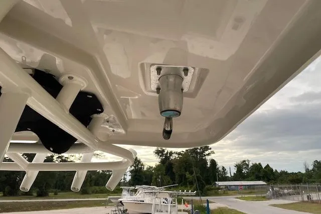 Slide: The Image of 2022 Boston Whaler 25' Outrage boat detail, featuring a mounted light fixture. - 25