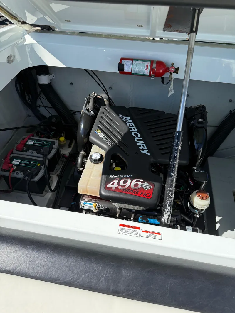 Slide: The Image of 2007 Baja 26 Outlaw engine compartment with Mercury MerCruiser 496 MAG HO engine. - 14