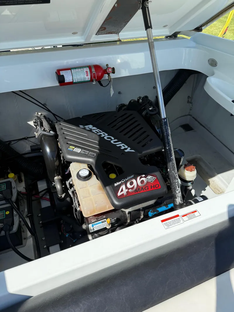 Slide: The Image of 2007 Baja 26 Outlaw boat engine compartment with MerCruiser 496 MAG HO engine. - 15