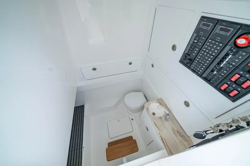 Slide: The Image of 2025 Valhalla Boatworks V-41 interior with control panel, sink, and toilet. - 36