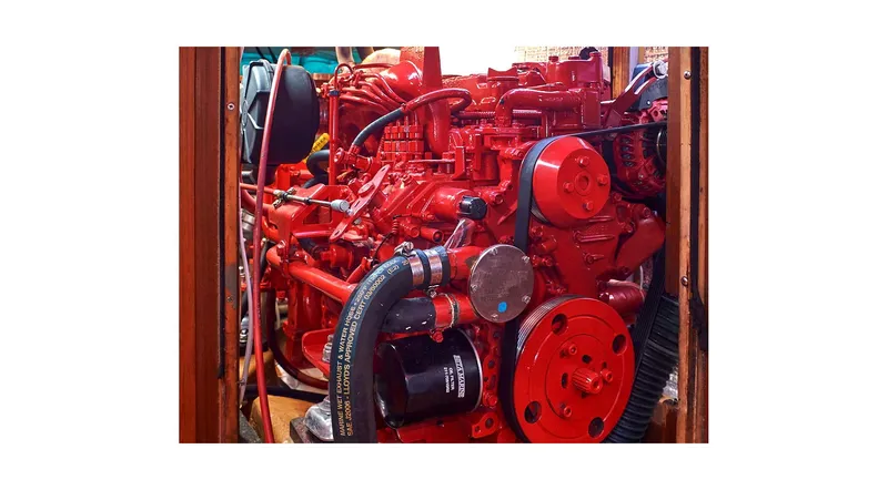 Slide: The Image of Interior of 1992 Wauquiez Centurion 45 yacht with wooden furnishings and teal seating. - 3