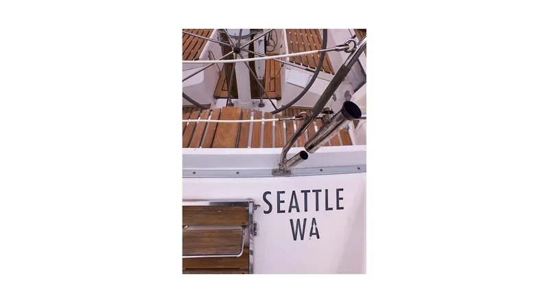 Slide: The Image of Teak deck of 1992 Wauquiez Centurion 45 sailboat with metal fittings. - 33