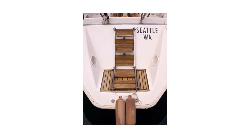 Slide: The Image of Wauquiez Centurion 45 sailboat, 1992, docked in Seattle, WA, featuring teak deck details. - 34