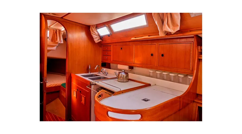 Slide: The Image of Sailboat Wauquiez Centurion 45, 1992 model, docked and for sale at marina. - 4