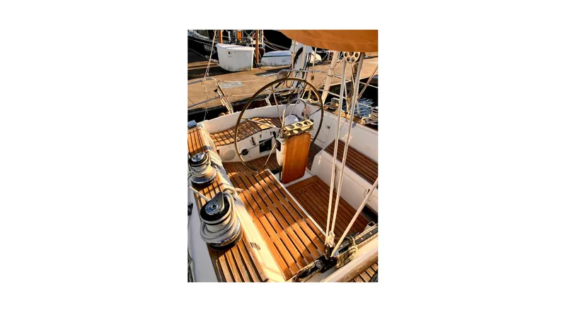 Slide: The Image of Deck of 1992 Wauquiez Centurion 45 sailboat with wooden finish and rigging details. - 40