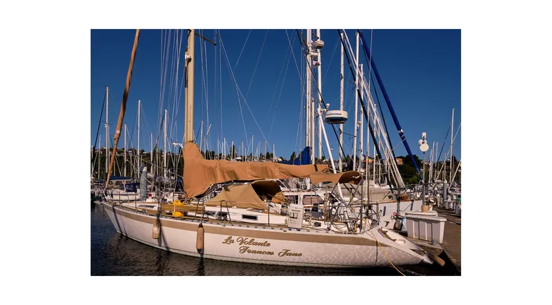 Slide: The Image of Sailboat Wauquiez Centurion 45, 1992 model, docked at a marina. - 7