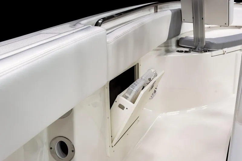 Slide: The Image of Manufacturer Provided Image: 2021 Robalo R242 Center Console boat interior detail with storage compartment. - 24