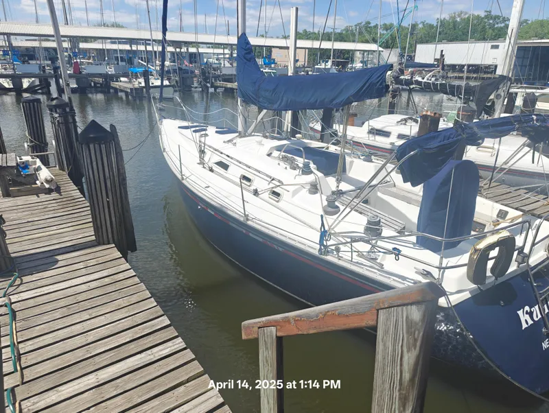 The Image of Sailboat docked at marina, Hunter 40 model, 1984, sunny day, April 14, 2025. - 0