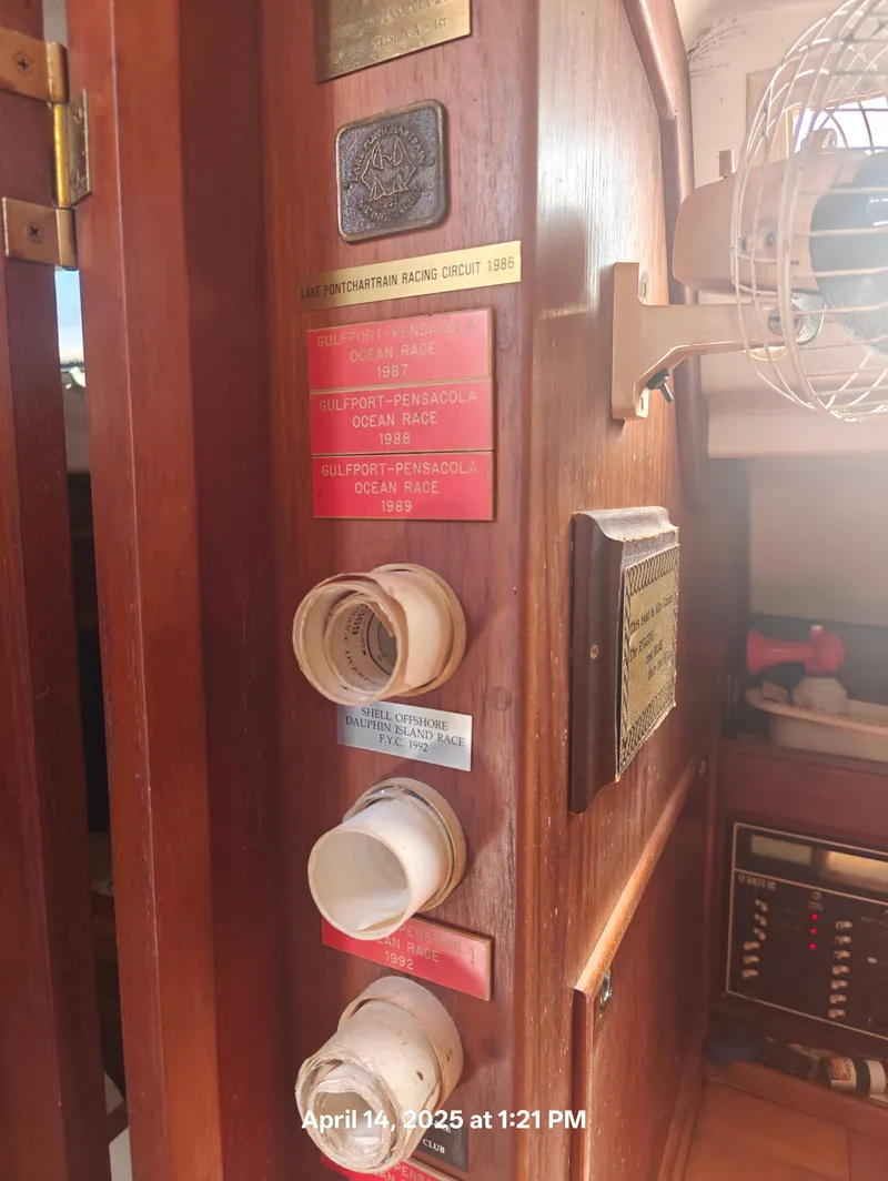 Slide: The Image of Interior of 1984 Hunter 40 sailboat with racing plaques and vintage equipment. - 23
