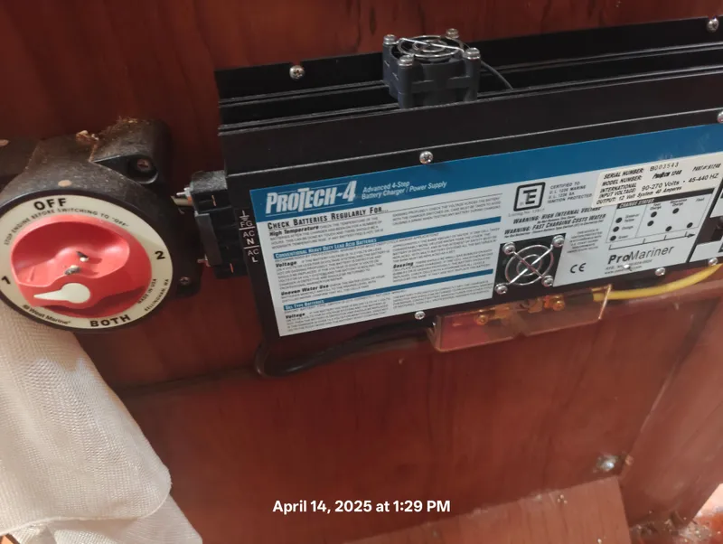 Slide: The Image of ProTech-4 battery charger in 1984 Hunter 40 boat, April 2025. - 40