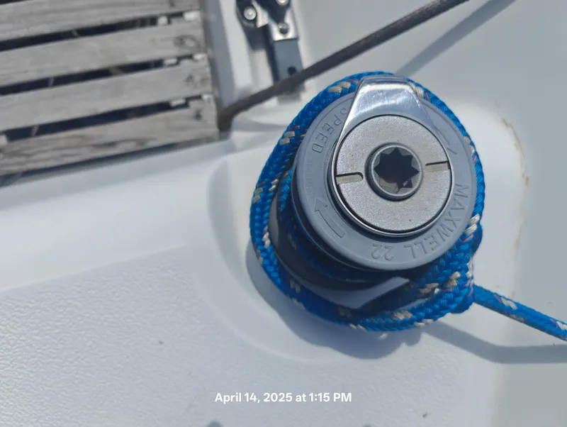 Slide: The Image of Winch with blue rope on 1984 Hunter 40 sailboat deck. - 9