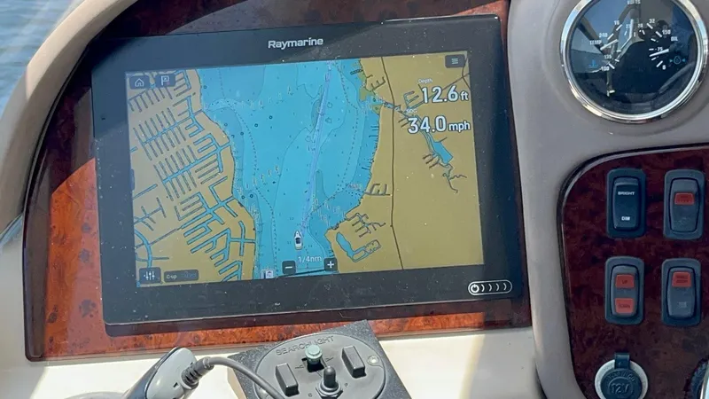 Slide: The Image of Navigation display on 2006 Carver 56 Voyager showing speed and depth. - 33