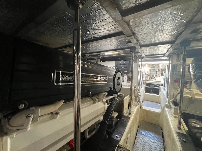 Slide: The Image of Engine room of a 2006 Carver 56 Voyager with Volvo Penta D12-675 engine. - 50