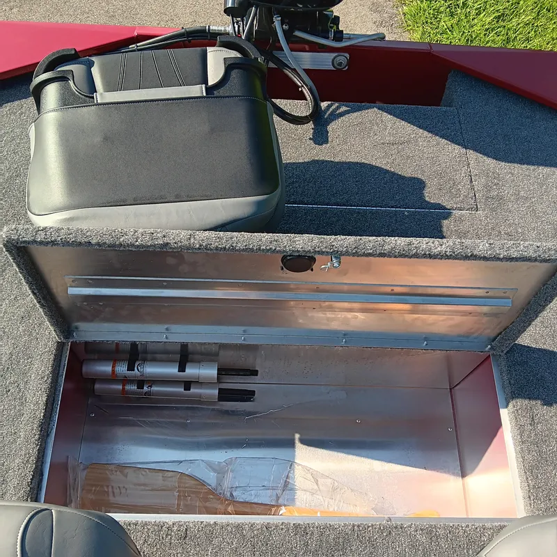 Slide: The Image of Open storage compartment in 2026 Tracker Bass Tracker Classic XL boat. - 10