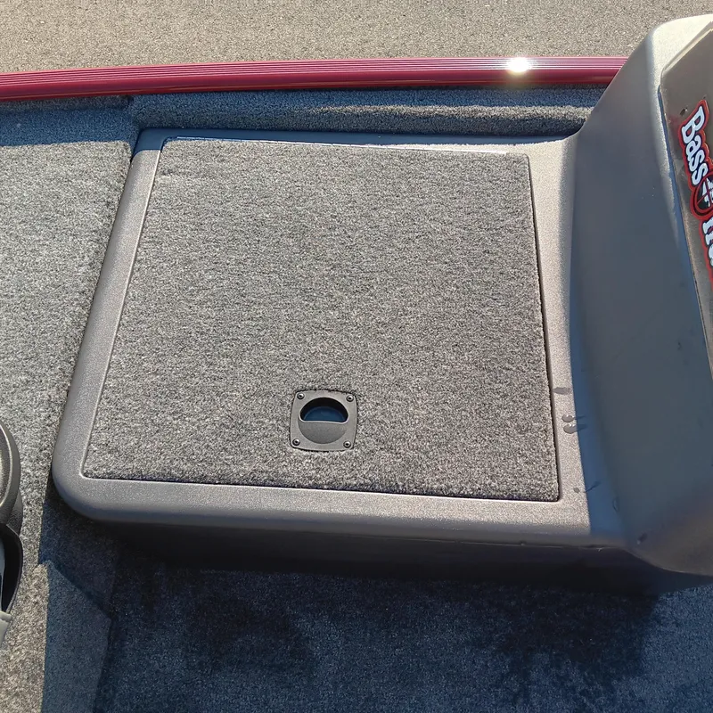 Slide: The Image of 2026 Tracker Bass Tracker Classic XL boat deck with storage compartment. - 7