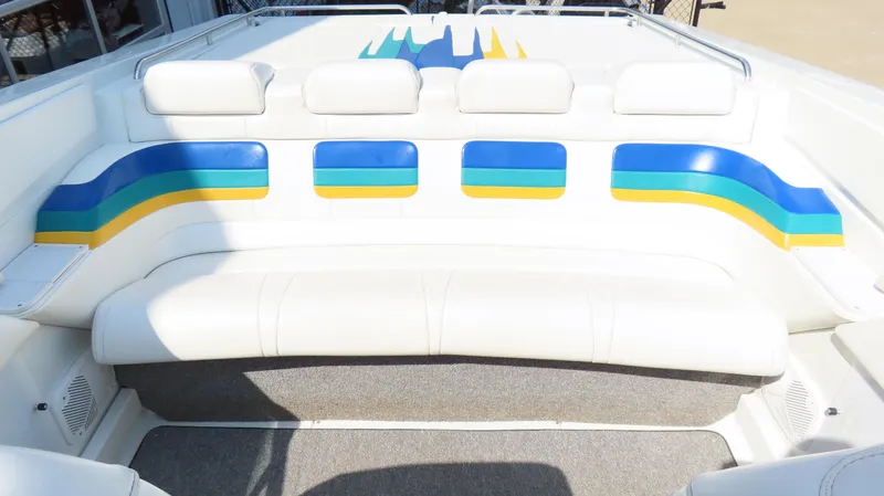Slide: The Image of 2000 Formula Fastech boat interior with colorful seating and modern design. - 12