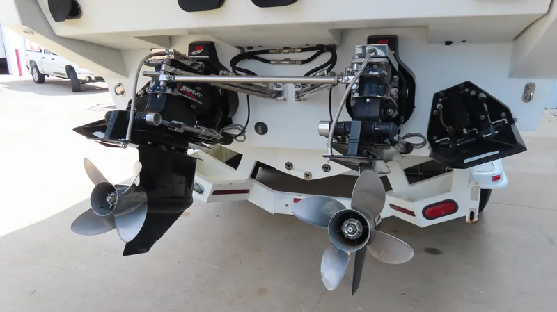 Slide: The Image of Rear view of 2000 Formula Fastech boat with dual propellers and Mercury outdrives. - 29