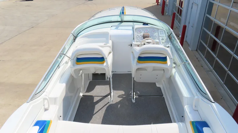 Slide: The Image of 2000 Formula Fastech boat interior with dual seats and control panel. - 7