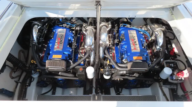 Slide: The Image of Twin engines in a 2000 Formula Fastech boat, showcasing high-performance components. - 8