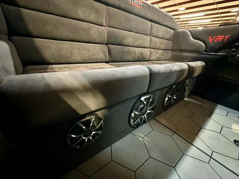 Slide: The Image of Luxurious interior of 2022 Velocity VR1 with plush seating and integrated speakers. - 20